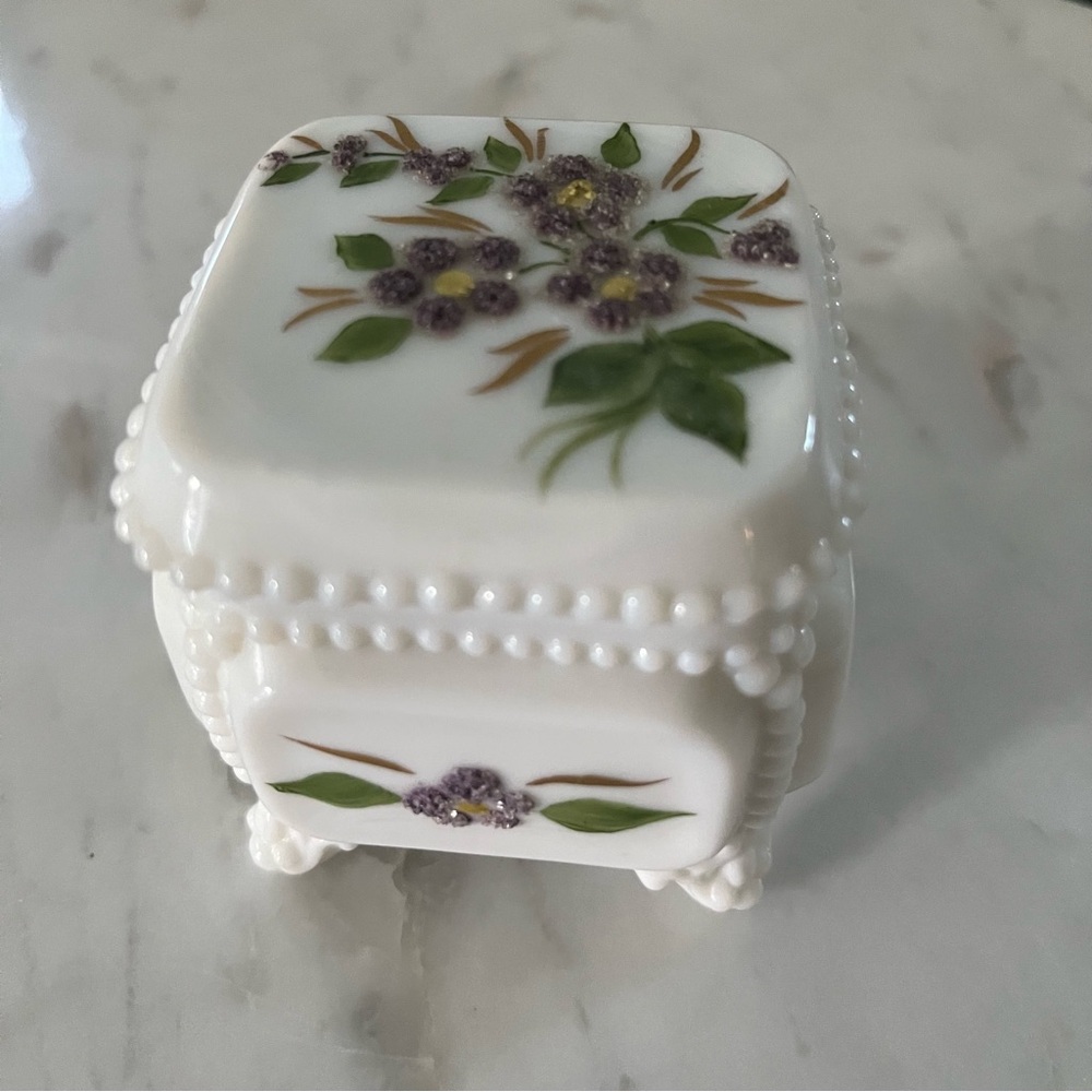 Vintage milk glass jewelry box.